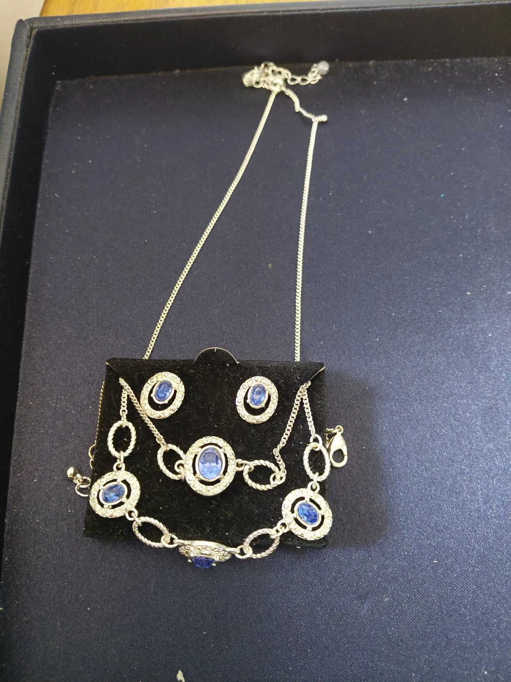 Avon Silver-Tone Necklace,  Bracelet and Earrings with Deep Blue Stones